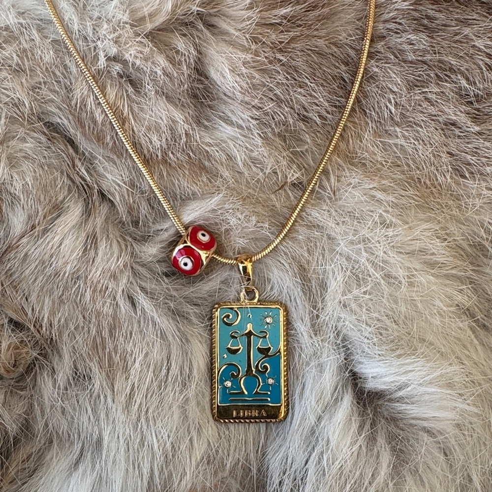 Gold Libra Pendant Necklace with Red Accents